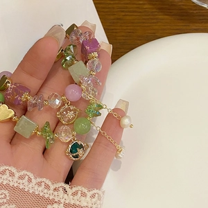 Sweet purple amethyst planet bracelet with green beads and gold star pendant