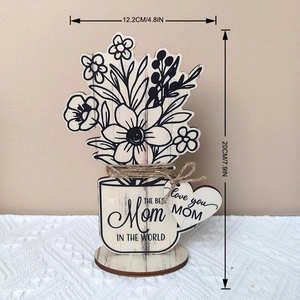 Detail of wooden Mother's Day plaque with flower design and heart-shaped gift tag