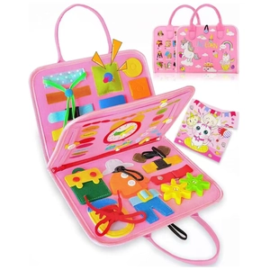 Detail of pink felt busy board with unicorn pattern, buckles, clock and sensory parts