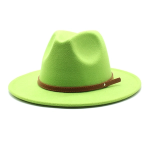 Close-up of neon green fedora hat featuring wool-like texture and brown leather band