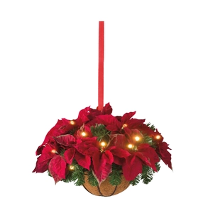 Detail of hanging Christmas basket with red poinsettia and warm LED lighting