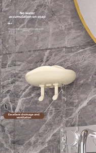 Detail of cloud-shaped wall soap dish with drainage holes and two bottom hooks
