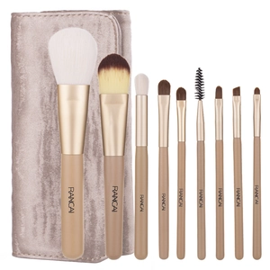 Professional 9-piece makeup brush set with champagne gold ferrules and a velvet travel pouch