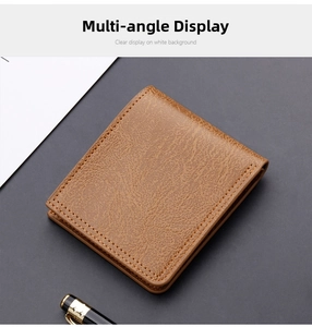 Detailed macro shot of brown leather texture and reinforced stitching on a men's wallet