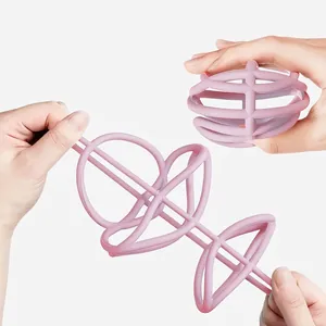 Pink food grade silicone teething ball toy with highly elastic and durable hollow design