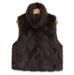 Detailed macro view of the fluffy faux fur texture on the brown high-neck vest