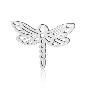 Detailed macro shot of a hollow dragonfly pendant crafted in polished stainless steel