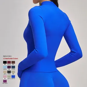 Slim fit seamless yoga jacket for women with high collar and long sleeves in bright blue