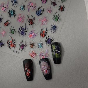Colorful spider Halloween nail stickers with metallic foil and 3D effects on black tips