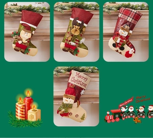 Detailed view of four festive Christmas stockings featuring Santa and Reindeer embroidery
