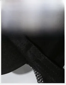 Detail view of the wide moisture-wicking sweatband inside the winter baseball cap