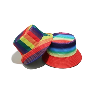 Rainbow striped bucket hats with vibrant patchwork and gradient designs for summer festivals