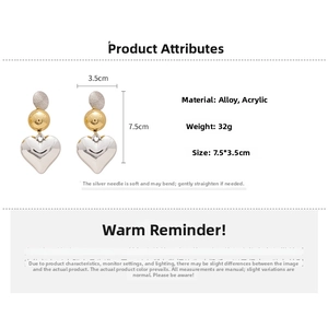 Detailed size specifications for mixed metal geometric heart earrings in silver and gold