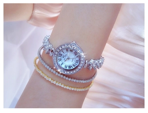 Close-up of BS Bee Sister silver quartz watch with crystal stones and matching bracelets