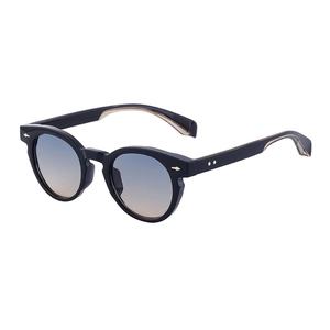 Vintage oval sunglasses with black frames, gradient lenses, and golden rivet accents