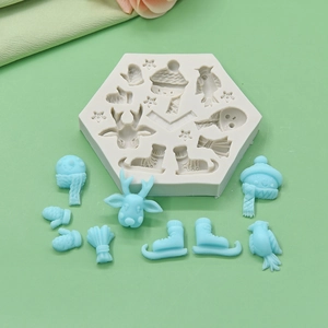 Winter themed hexagon silicone mold with deer, skates, and snowman shapes for DIY baking