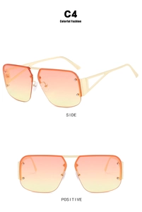 Detail view of square rimless aviator sunglasses with orange gradient lenses and gold temples