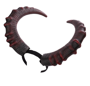 Close-up of red and black devil horns headband with realistic spiral texture for Halloween