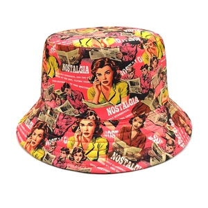 Detailed view of bucket hat with pink vintage comic print and nostalgia pop art pattern