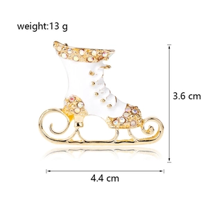 Christmas ice skate brooch with white enamel and colorful rhinestones in gold finish