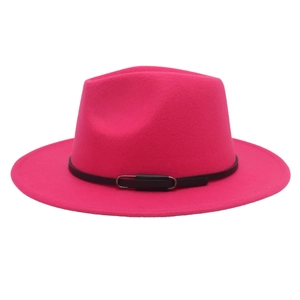 Detail of fuchsia wool fedora hat featuring a slim black leather belt with metal buckle