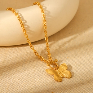Golden titanium steel ball chain necklace featuring a butterfly pendant and OT clasp