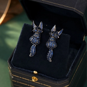 Elegant fox stud earrings with navy blue crystals in a premium gift box