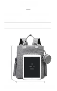 Waterproof grey Oxford diaper backpack with dimension markers and size comparison
