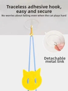 Detail of detachable metal connector buckle on retractable cat toy with suction hook