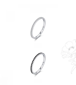Detail view of S925 sterling silver band showing micro-pave white and black cubic zirconia