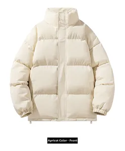 Detail view of apricot padded jacket featuring stand-up collar and quilted texture