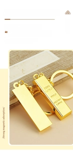 Close-up of gold bar keychain with Fine Gold 999.9 engraving and strong magnetic feature