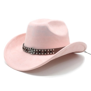 Detail of pink faux suede cowboy hat featuring brown leather band and vintage metal buckle