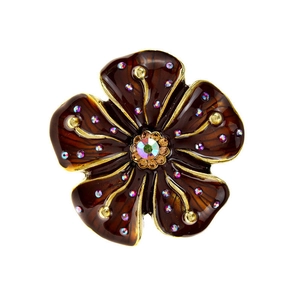 Vintage floral brooch with brown enamel petals and purple crystals on white background