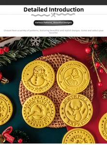 Close-up of Christmas cookies with stamped snowman and reindeer patterns and holiday motifs
