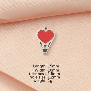 Detailed view of silver hot air balloon pendant with dimensions and red heart enamel