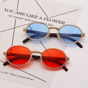 Retro round sunglasses with rhinestones and UV400 protection in red and blue lenses