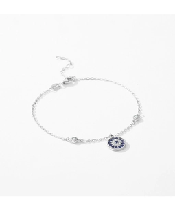 Close-up of S925 sterling silver chain bracelet with blue evil eye pendant and lobster clasp