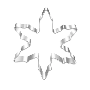 Macro detail of snowflake cookie cutter showing rolled edges and polished metal finish