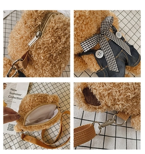 Detail view of brown plush teddy bear bag with zipper, metal chain strap and blue denim outfit