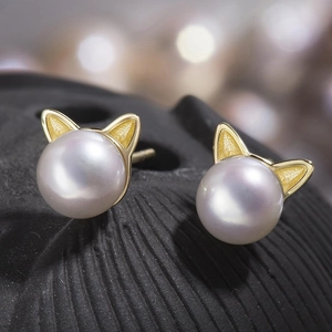 Elegant gold cat ear pearl earrings set for women featuring frosted gold and white pearls