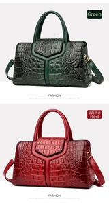 Detailed close-up of green and wine red faux crocodile leather bags with metal clasps