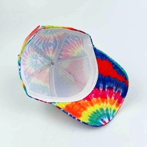 Internal view of rainbow tie-dye baseball cap showing detailed stitching and lining