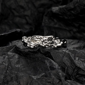 Lava texture 925 sterling silver open ring with irregular artistic design on black background
