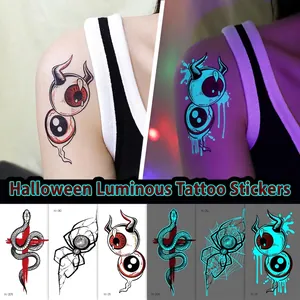 Luminous blue Halloween tattoos featuring spiders, snakes, and demon eyes with glow effect