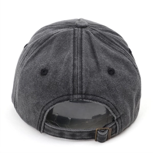 Detail view of the washed charcoal baseball cap featuring an adjustable metal buckle