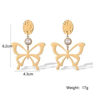Detailed view of gold butterfly earrings with dimensions 6.2cm by 4.3cm and 17g weight