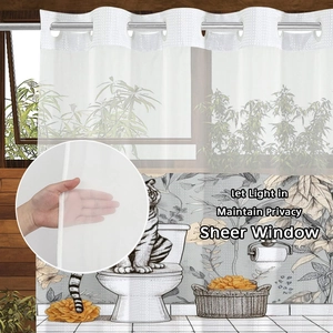 White double-layer waffle shower curtain with silver metal rings and sheer privacy fabric