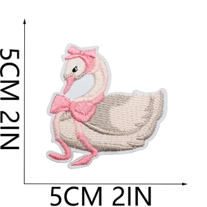 Detailed close-up of a pink swan embroidery patch with a bow measuring 5cm by 5cm
