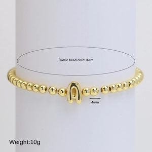 Elastic 18k gold beaded bracelet with a minimalist 3D letter A pendant charm